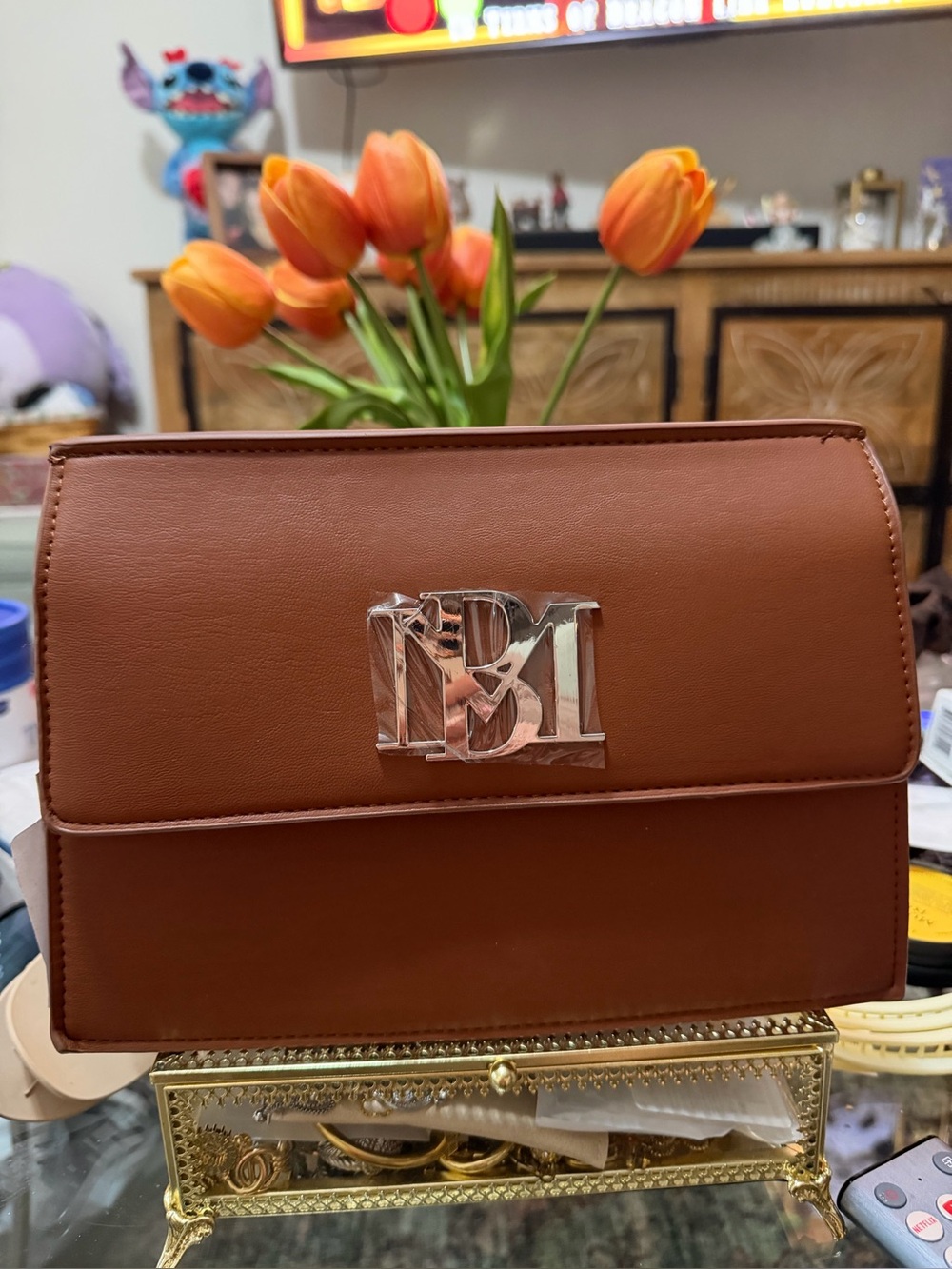 Badsley Mishka Brown Leather Crossbody Bag with Silver Logo